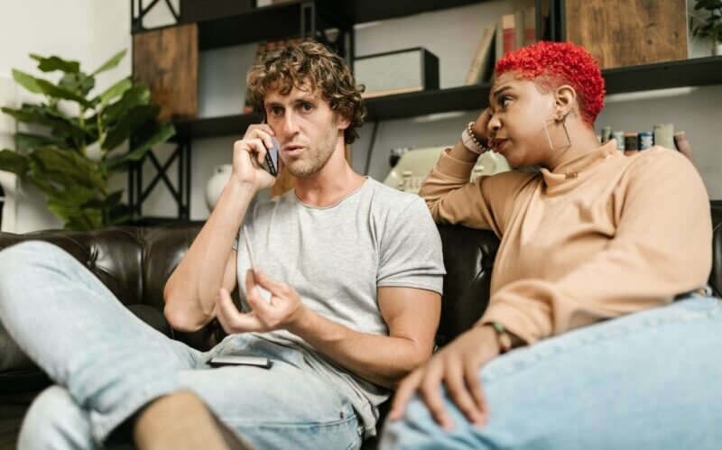 Distressed Man in debt on a Phone Call