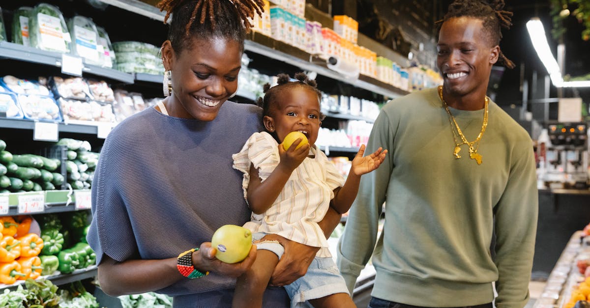 Saving money on groceries - Happy family shopping together in a bright and lively supermarket, enjoying fresh produce.