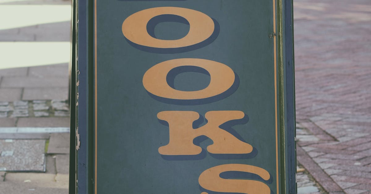 Thrifting in the UK - Signboard for England's largest secondhand bookshop on an urban street.
