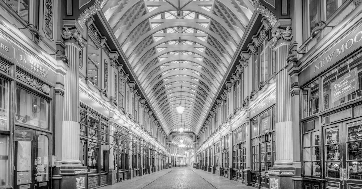 Affordable Staycations UK - A classic monochrome view of the historic Leadenhall Market's stunning architecture in London, UK.