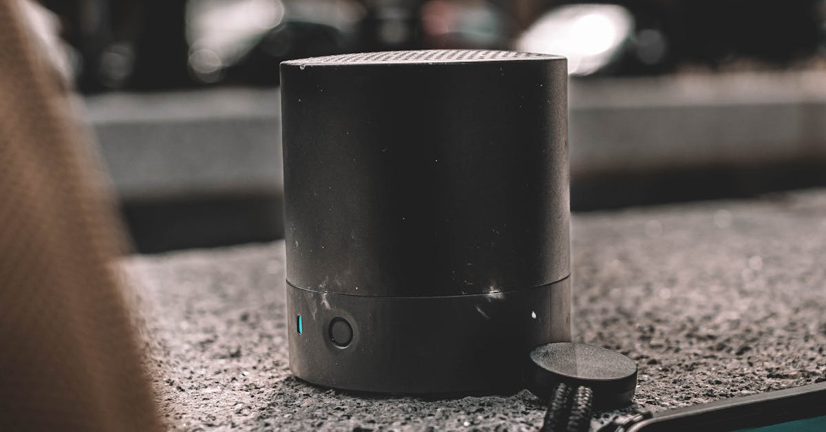 Rainwater Harvesting in the UK - Stylish portable speaker placed outdoors on a stone surface, captured in London.