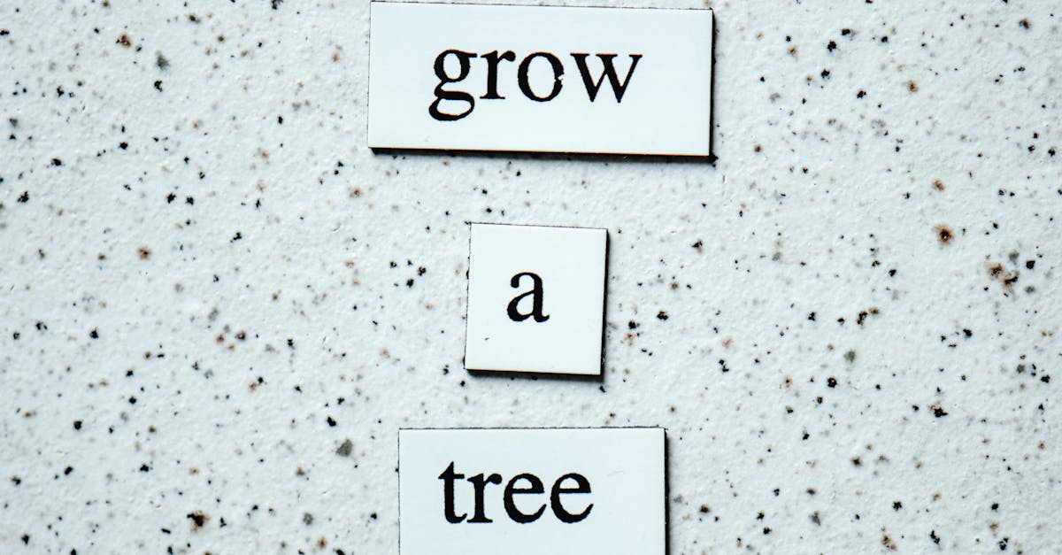 Selling carbon credits - Creative text arrangement advocating tree growth on a speckled surface, ideal for environmental themes.
